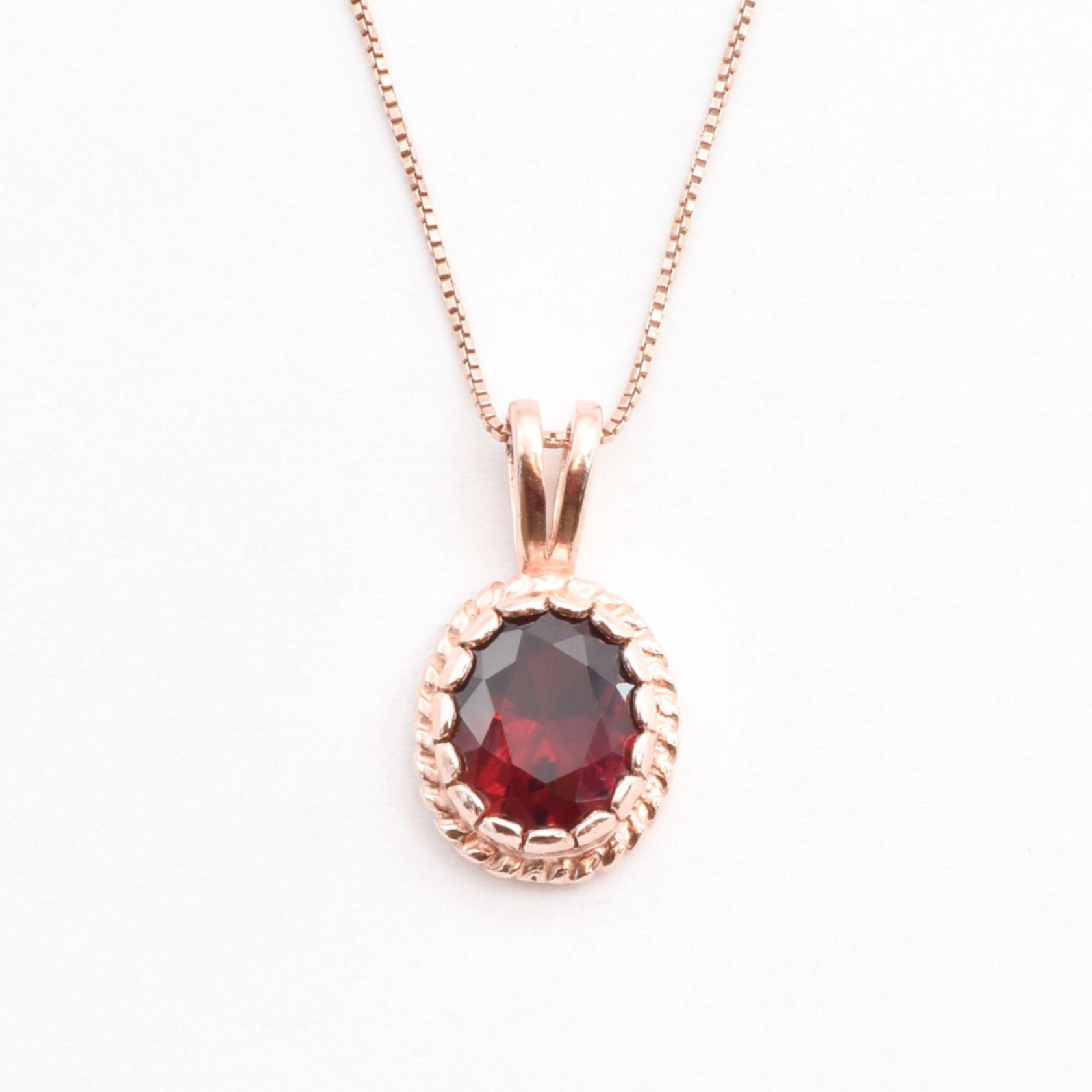 Created Ruby Pendant made in Rose Gold Vermeil with Oval Created Red Ruby in Solitaire setting, July Birthstone gift idea, symbolizes nobility, purity, and passion, ideal for everyday wear and perfect for birthday gifting and special occasions.