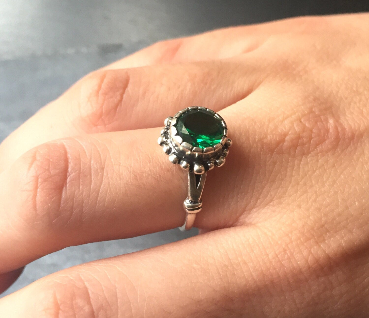 Created Emerald Ring in 925 Sterling Silver with Round Green Emerald, perfect for May birthdays and special occasions.