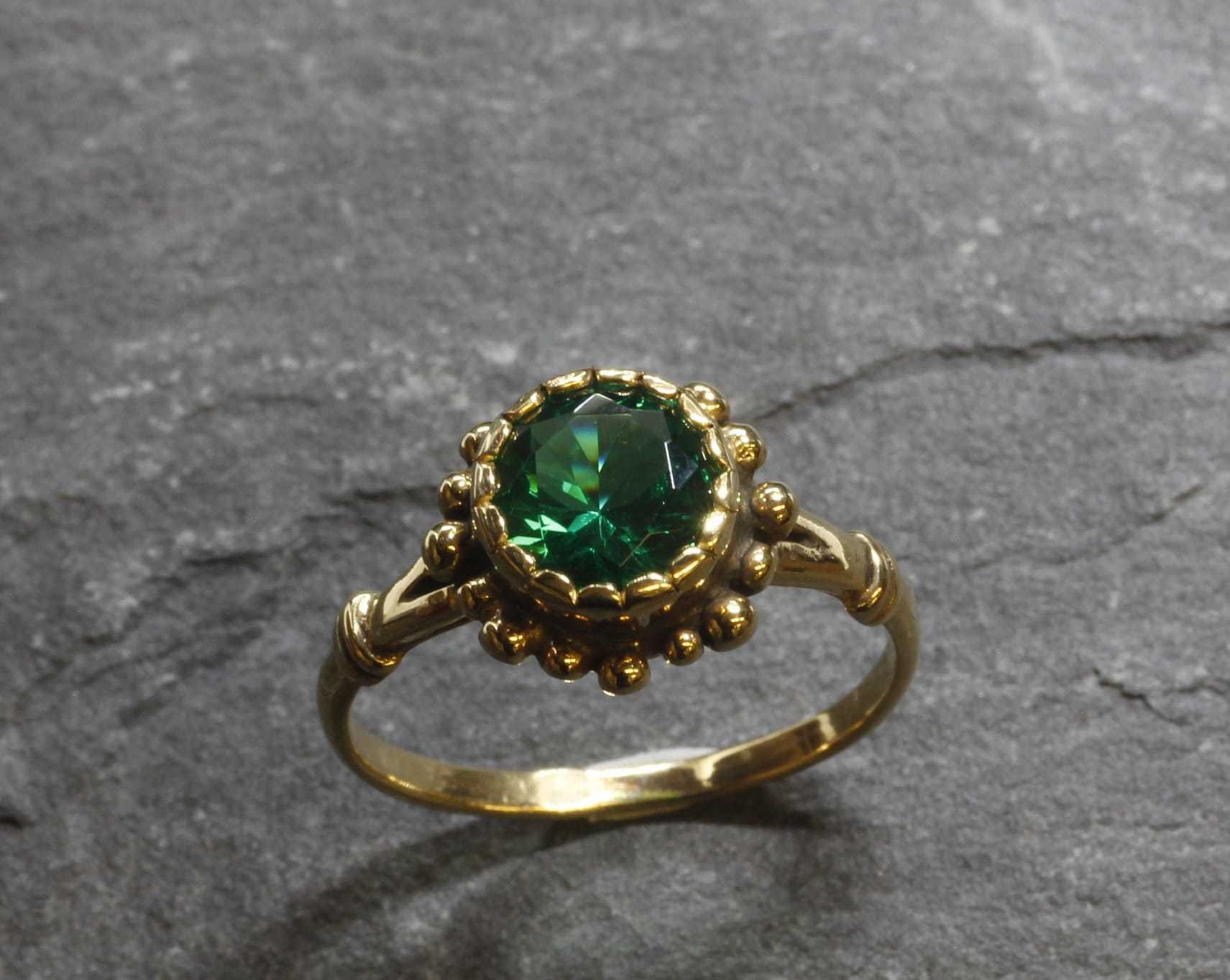 Elegant 18k Gold Vermeil Emerald Ring featuring a vibrant Round Created Green Emerald, perfect for May birthdays and special occasions.