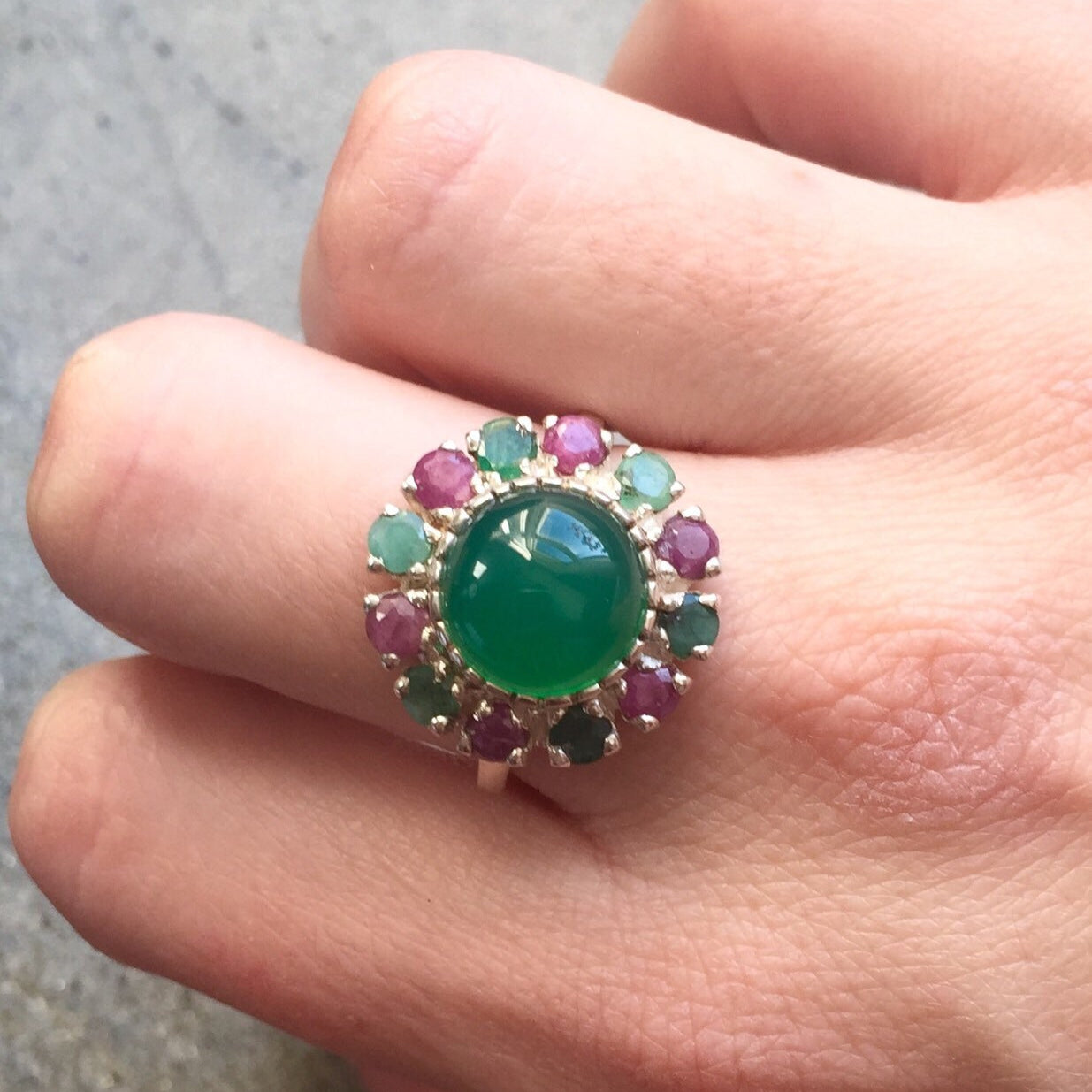 Elegant 925 Sterling Silver ring featuring a Round Created Green Emerald in a stunning Halo design, ideal for special occasions.