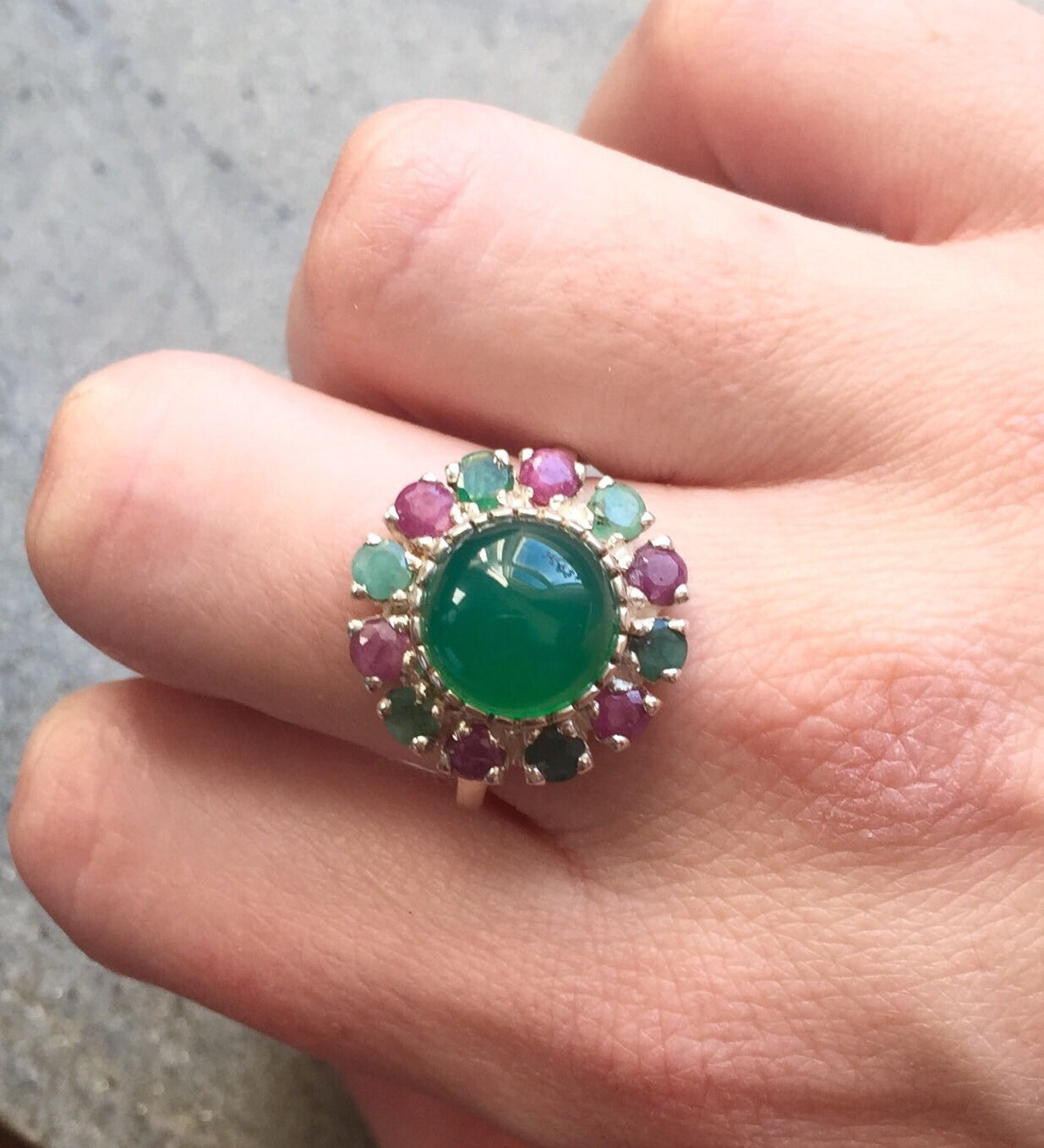 Elegant 925 Sterling Silver ring featuring a Round Created Green Emerald in a stunning Halo design, ideal for special occasions.