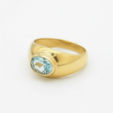 Elegant 18k Gold Vermeil ring with a radiant oval Aquamarine, symbolizes strength and ideal for daily wear and gifting.