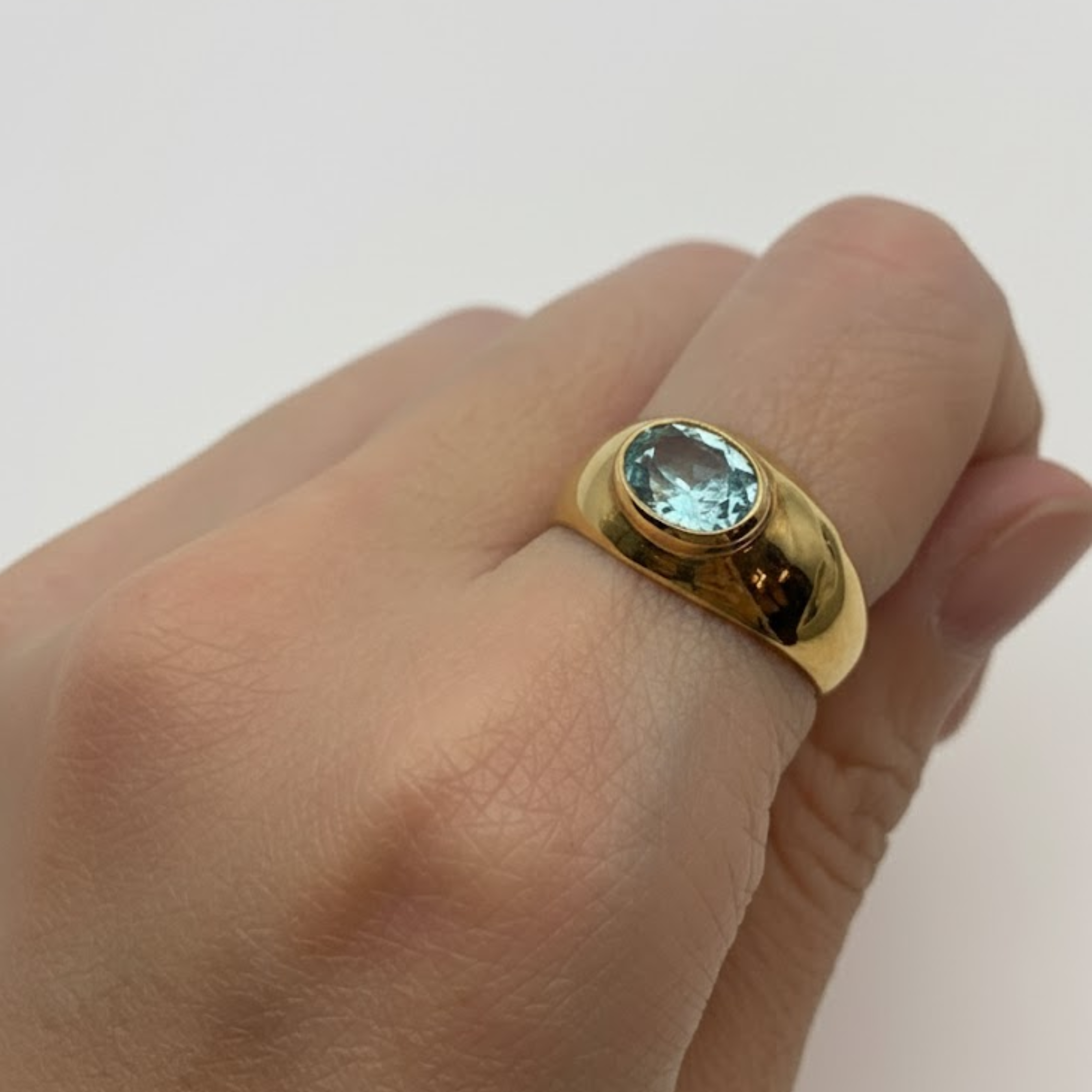 Beautiful 18k Gold Vermeil Aquamarine Ring featuring a stunning oval stone, perfect for birthdays and special occasions.
