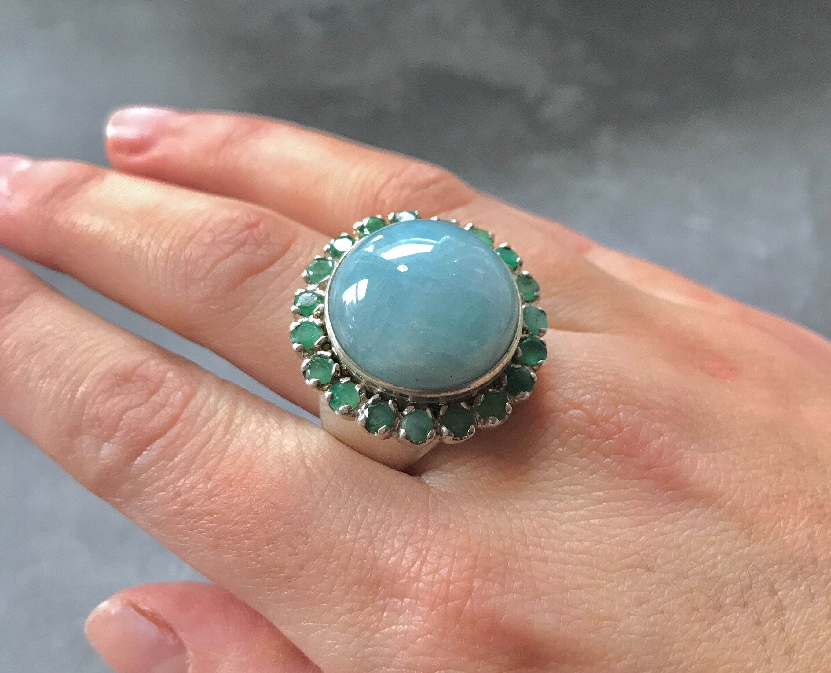 Elegant Sterling Silver Aquamarine Ring featuring a dazzling halo, perfect for March birthdays and everyday elegance.