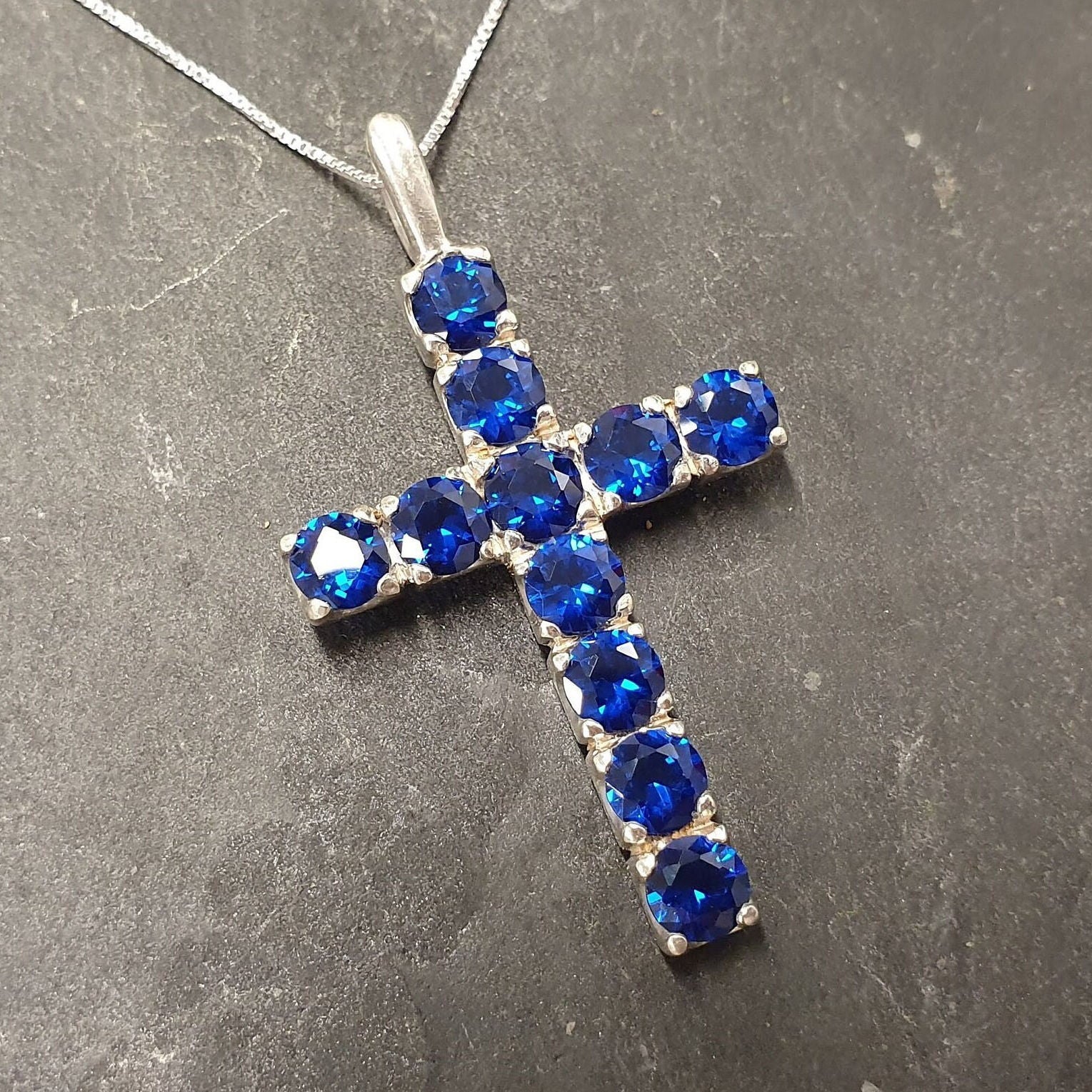 Dazzling Created Sapphire Pendant in 925 Sterling Silver, featuring a round blue sapphire—perfect for special moments and daily charm.