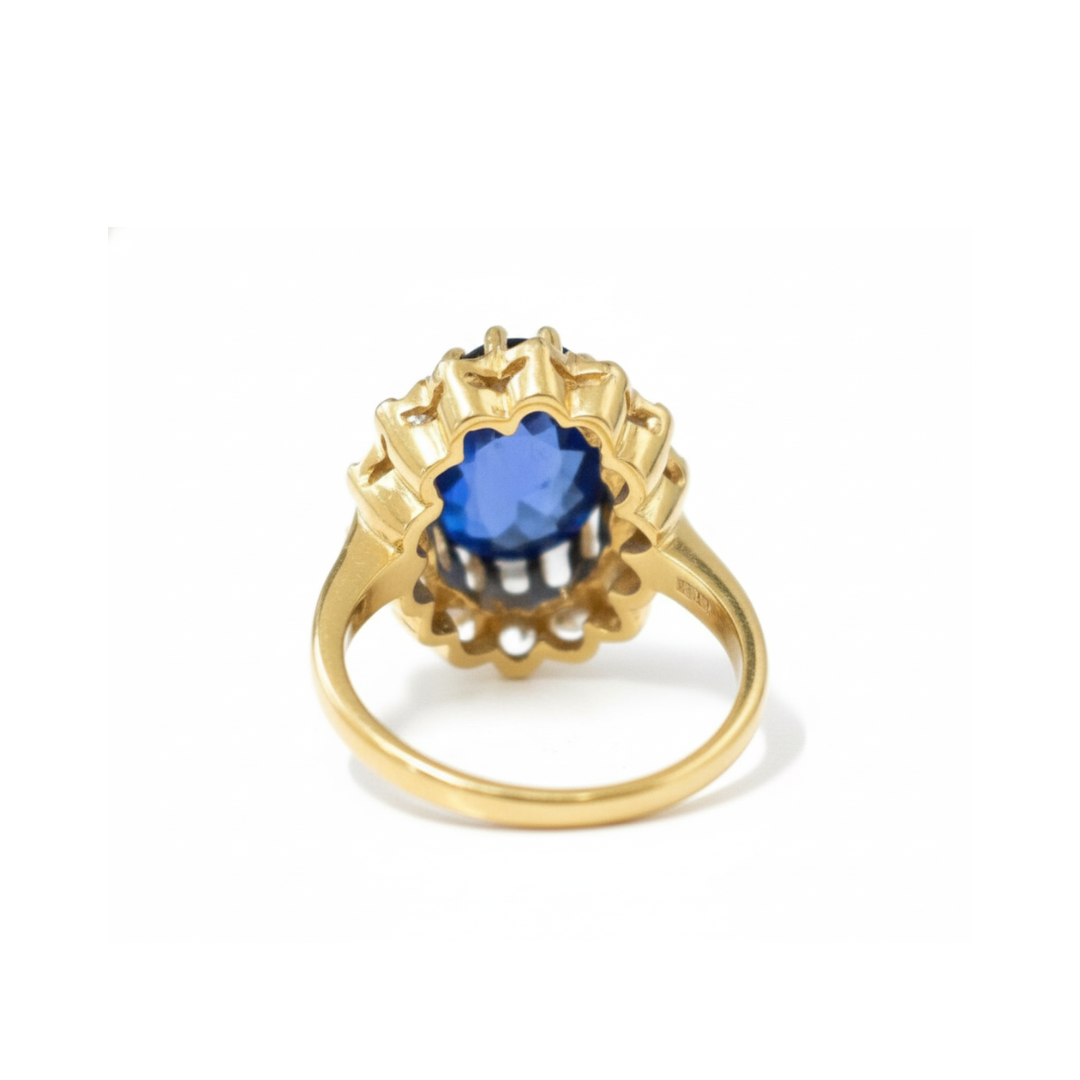 Gorgeous 18k Gold Vermeil Ring showcasing an Oval Blue Sapphire in Halo, a timeless piece for special moments and everyday style.