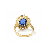 Gorgeous 18k Gold Vermeil Ring showcasing an Oval Blue Sapphire in Halo, a timeless piece for special moments and everyday style.