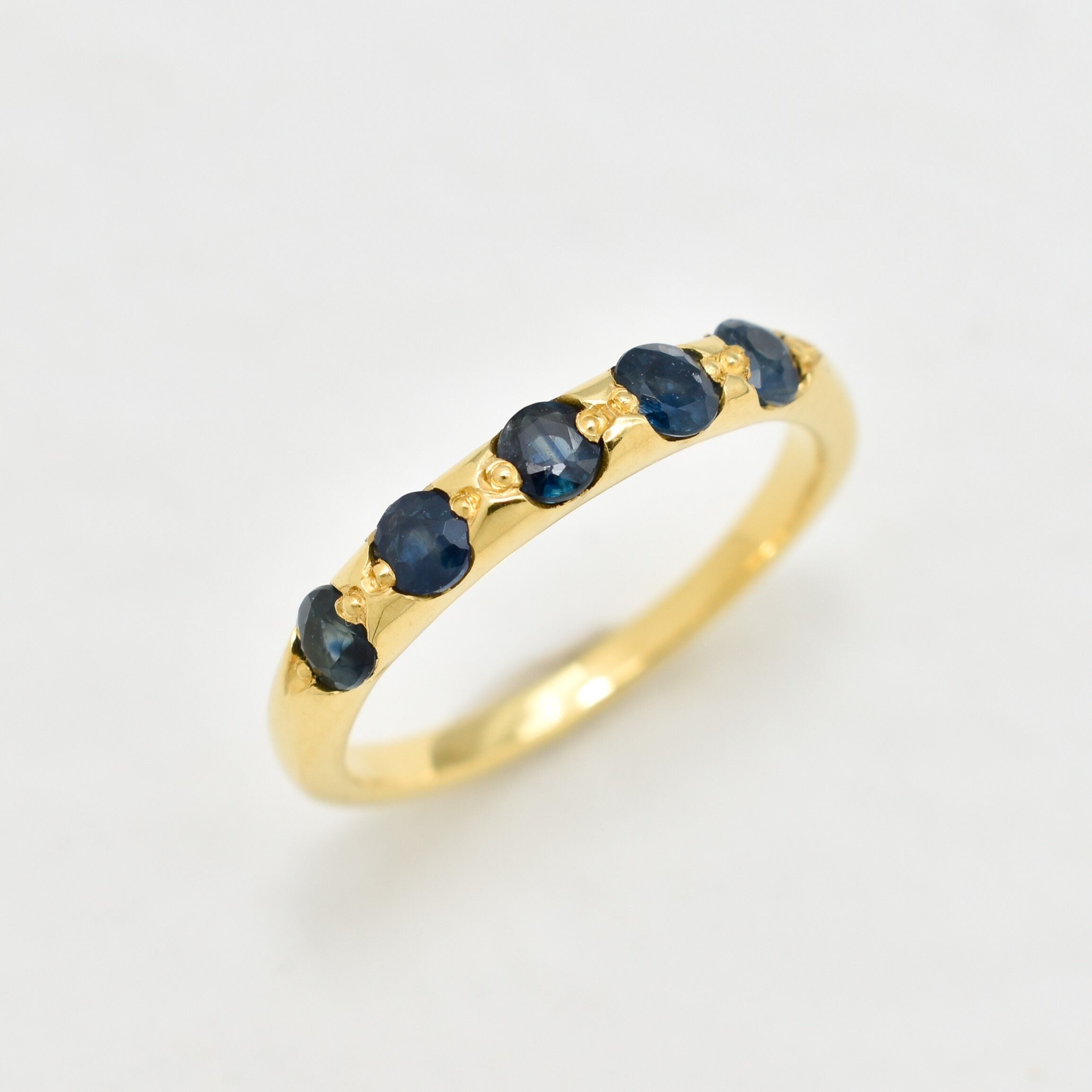 Natural Sapphire Ring made in 18k Gold Vermeil with Round Natural Blue Sapphire in Channel-Set setting, September Birthstone gift idea, symbolizes sincerity, truth, and faithfulness, ideal for everyday wear and perfect for birthday gifting and special occasions.