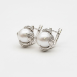 Stylish Sterling Silver Earrings with Natural White Pearls, symbolizing purity and ideal for June birthdays and special celebrations.