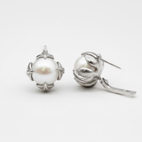 Natural Pearl Earrings made in 925 Sterling Silver with Natural White Pearl in Prong setting, June Birthstone gift idea, symbolizes purity and integrity, ideal for everyday wear and perfect for birthday gifting and special occasions.