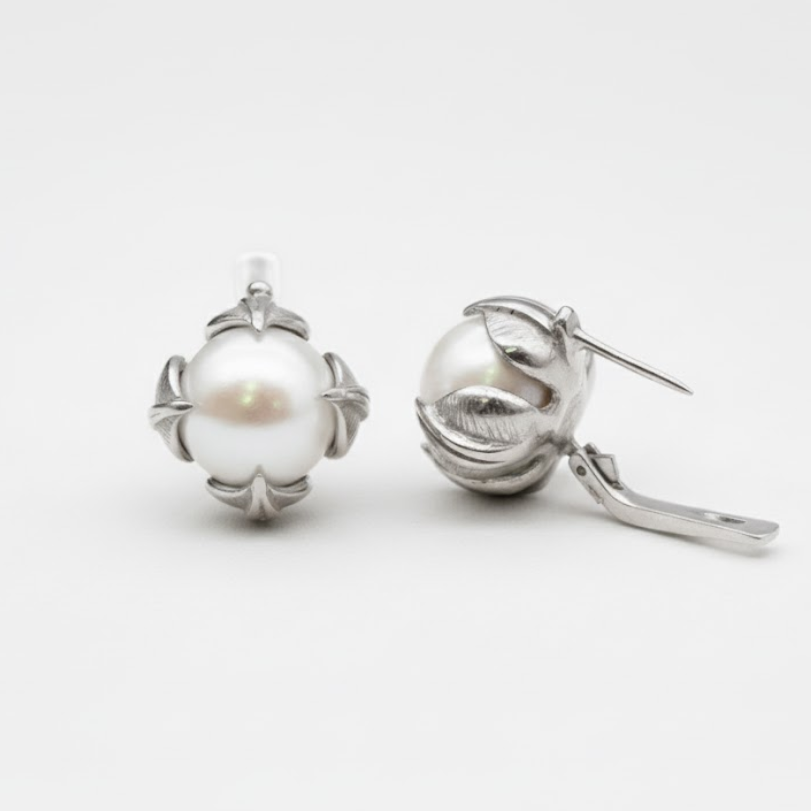 Natural Pearl Earrings made in 925 Sterling Silver with Natural White Pearl in Prong setting, June Birthstone gift idea, symbolizes purity and integrity, ideal for everyday wear and perfect for birthday gifting and special occasions.