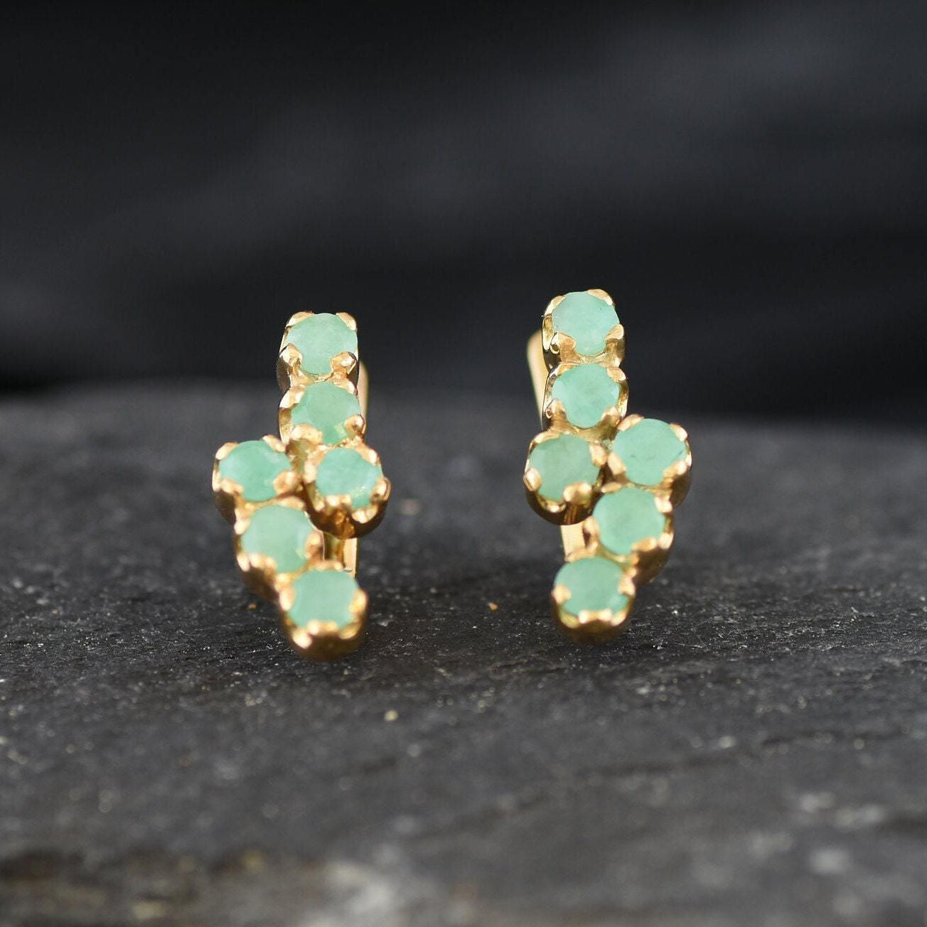 Elegant 18k Gold Vermeil Emerald Earrings with prong-set green gems, symbolizing harmony and ideal for everyday elegance.
