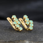 Stunning 18k Gold Vermeil Emerald Earrings showcasing vibrant green emeralds, a beautiful choice for any occasion or everyday wear.