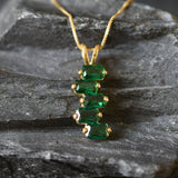 Delicate 18k Gold Vermeil cluster pendant showcasing Created Emeralds, perfect for celebrating May birthdays and special moments.