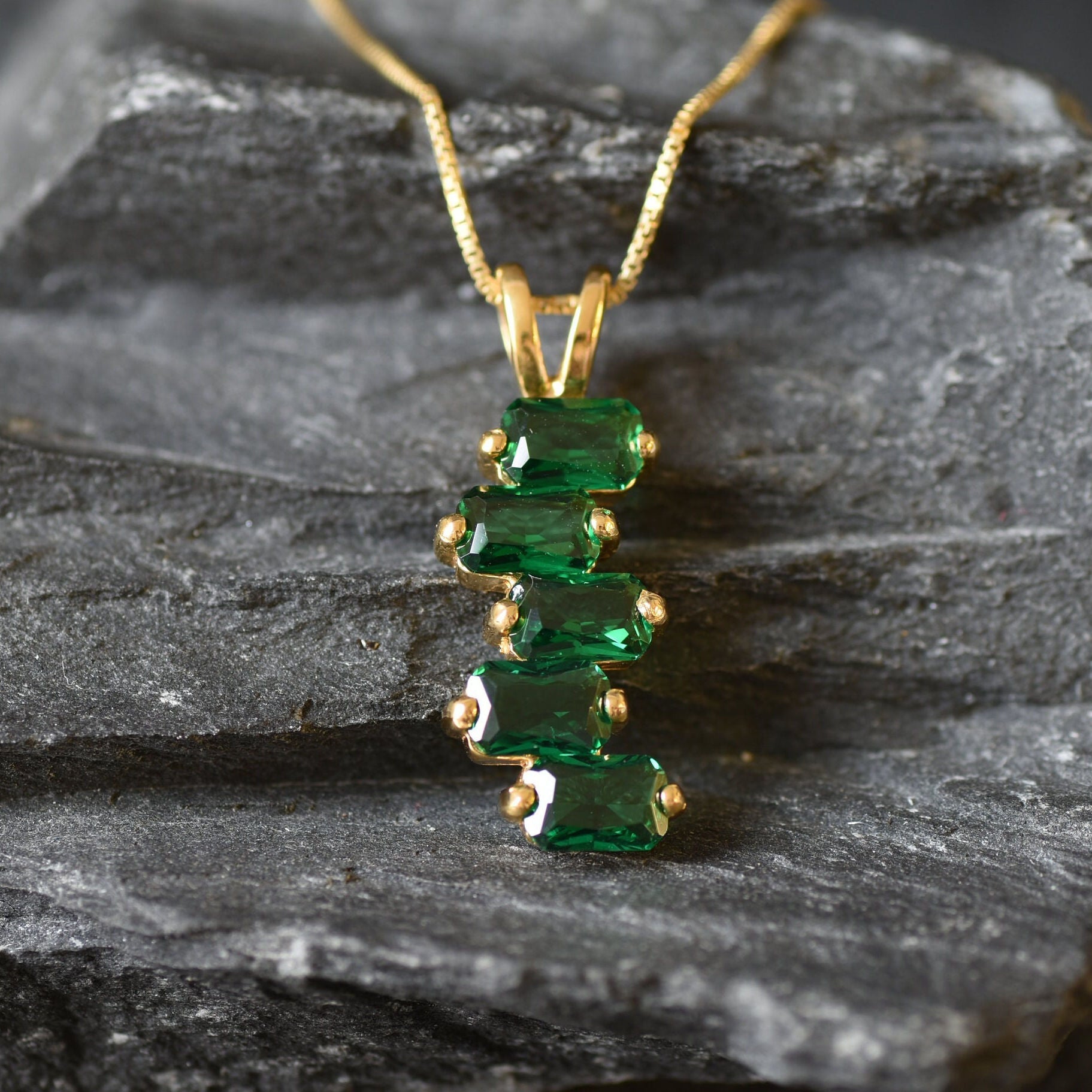 Delicate 18k Gold Vermeil cluster pendant showcasing Created Emeralds, perfect for celebrating May birthdays and special moments.