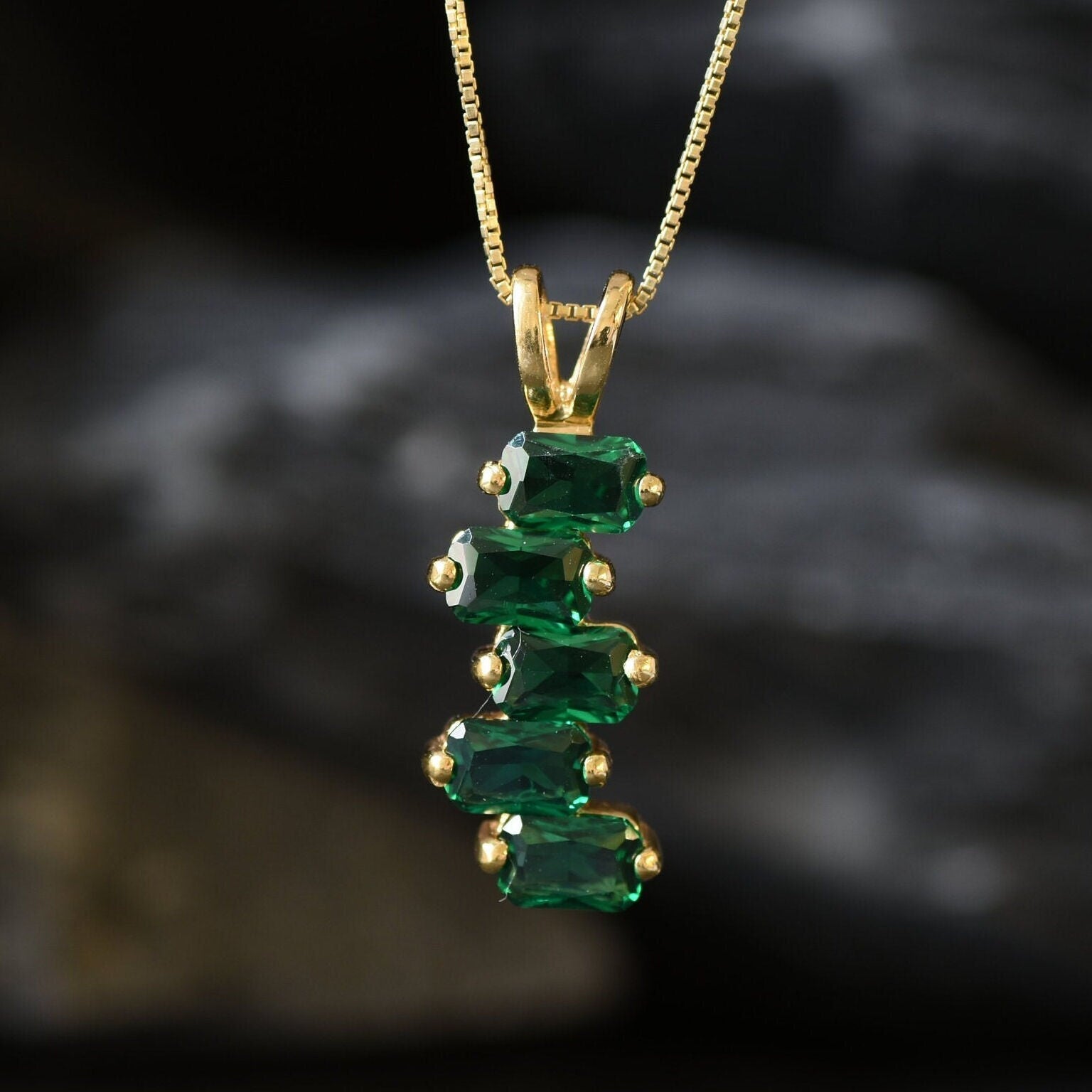 Radiant 18k Gold Vermeil pendant adorned with Created Emeralds, a timeless piece for everyday wear and May birthday celebrations.