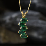 Radiant 18k Gold Vermeil pendant adorned with Created Emeralds, a timeless piece for everyday wear and May birthday celebrations.