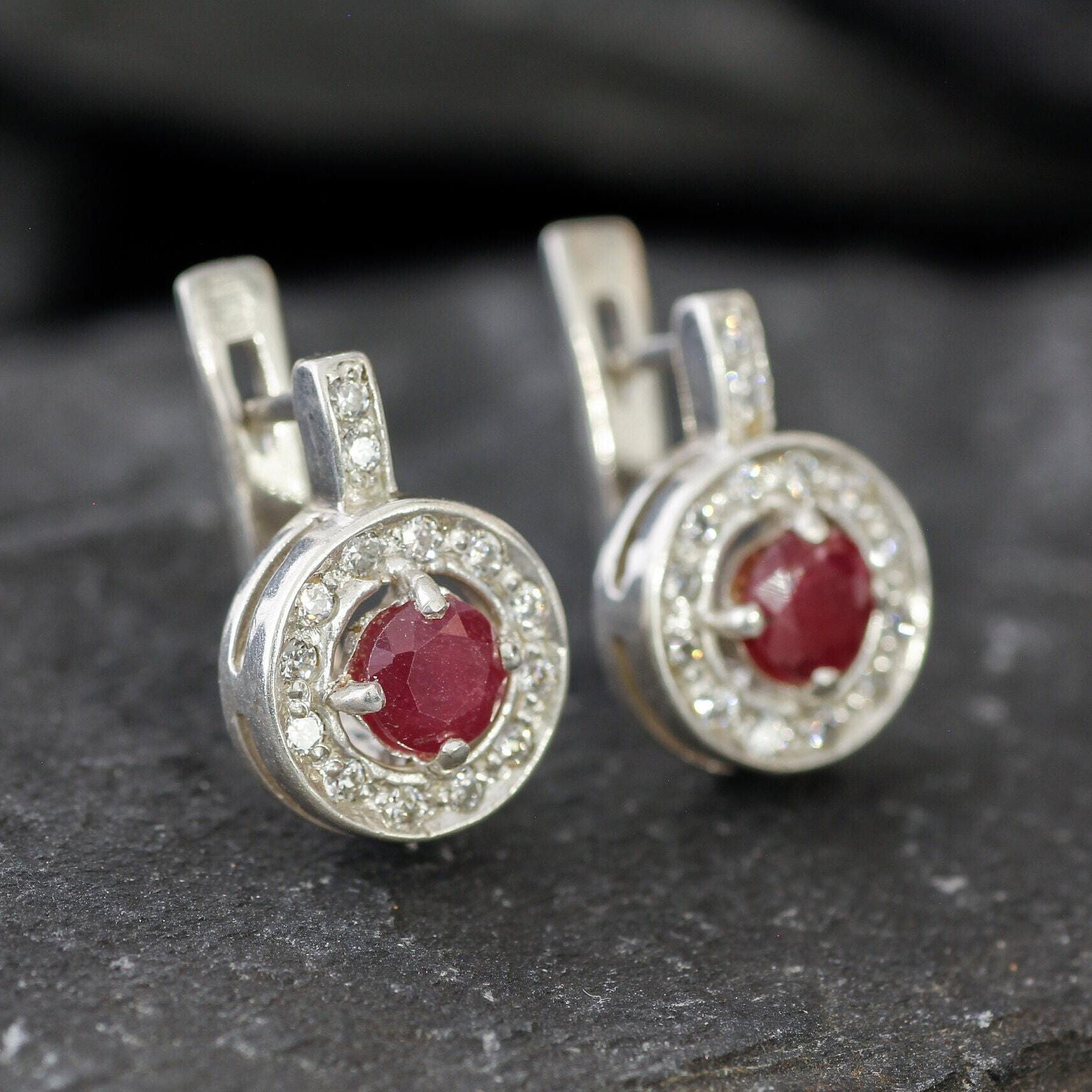 Beautiful 925 Sterling Silver Earrings with Round Natural Ruby, embodying elegance and a perfect July birthday gift choice.