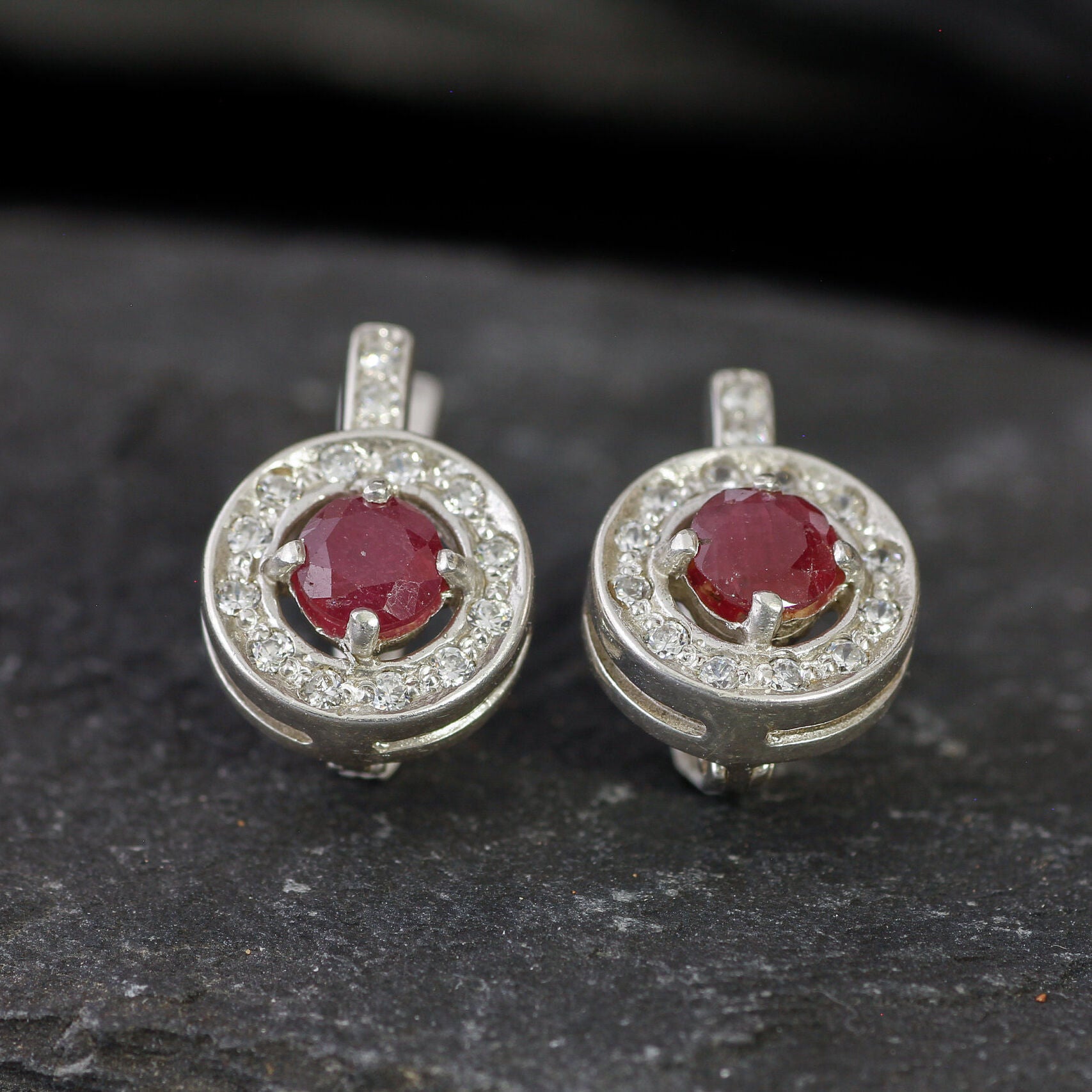 Stunning 925 Sterling Silver Earrings adorned with Natural Ruby, a symbol of love and passion, perfect for any occasion.
