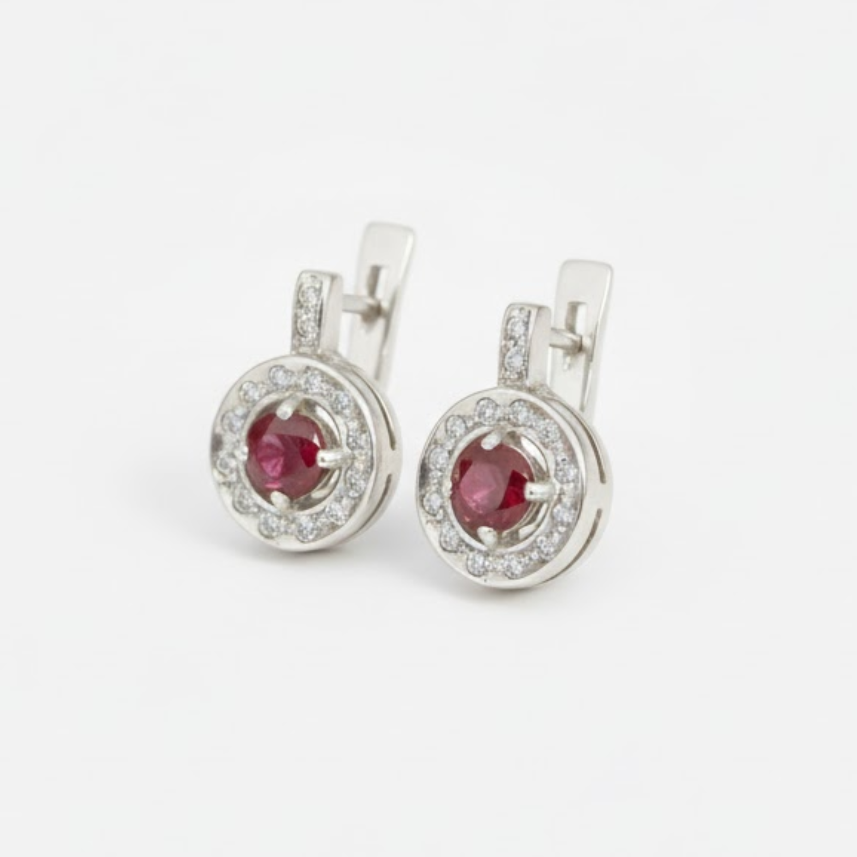 Natural Ruby Earrings made in 925 Sterling Silver with Round Natural Red Ruby in Halo setting, July Birthstone gift idea, symbolizes nobility, purity, and passion, ideal for everyday wear and perfect for birthday gifting and special occasions.