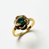Elegant 18k gold vermeil ring adorned with a round created emerald, a beautiful May birthstone for everyday elegance.