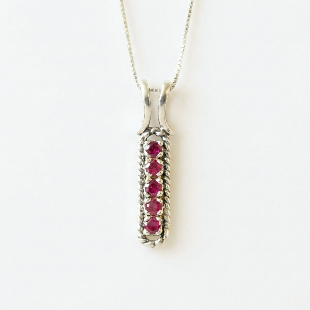 Created Ruby Pendant made in 925 Sterling Silver with Round Created Red Ruby in Channel-Set setting, July Birthstone gift idea, symbolizes nobility, purity, and passion, ideal for everyday wear and perfect for birthday gifting and special occasions.