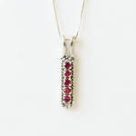 Created Ruby Pendant made in 925 Sterling Silver with Round Created Red Ruby in Channel-Set setting, July Birthstone gift idea, symbolizes nobility, purity, and passion, ideal for everyday wear and perfect for birthday gifting and special occasions.
