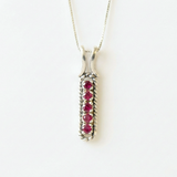 Created Ruby Pendant made in 925 Sterling Silver with Round Created Red Ruby in Channel-Set setting, July Birthstone gift idea, symbolizes nobility, purity, and passion, ideal for everyday wear and perfect for birthday gifting and special occasions.
