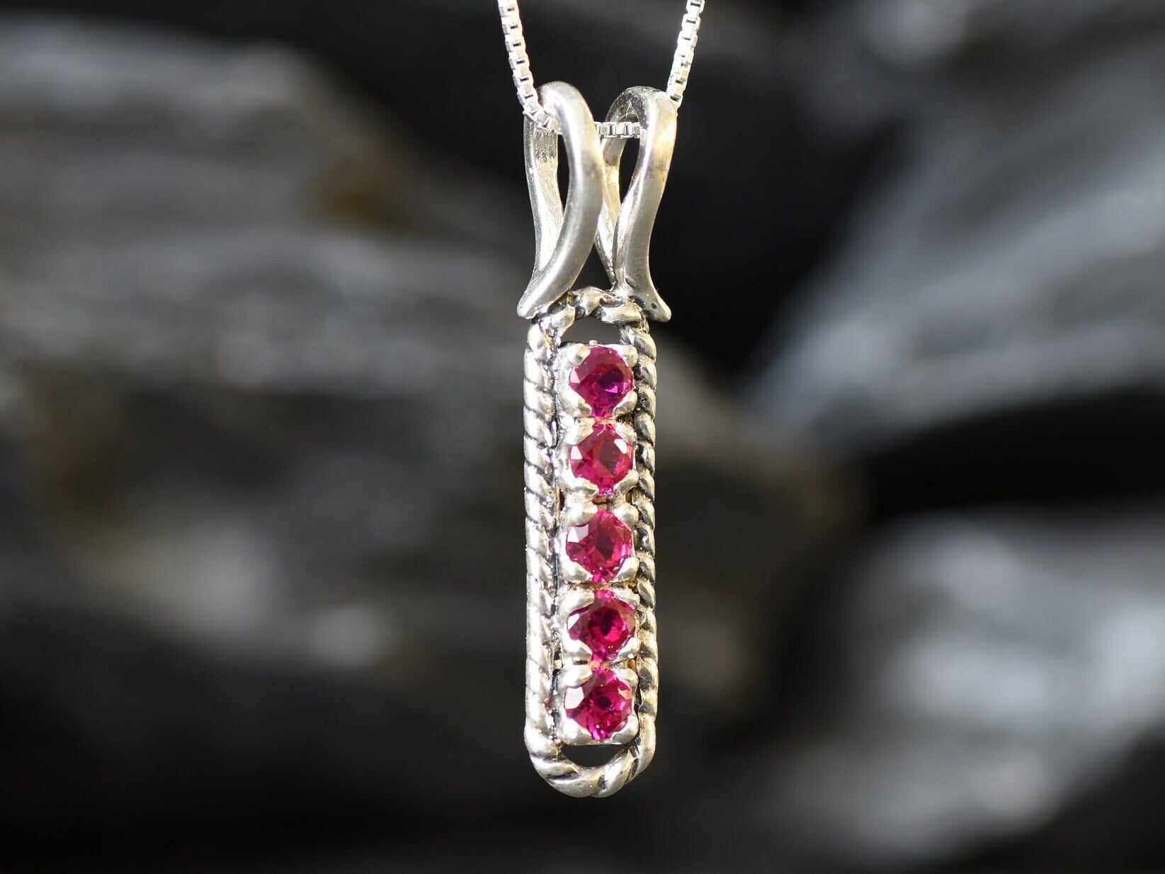 Created Ruby Pendant made in 925 Sterling Silver with Round Created Red Ruby in Channel-Set setting, July Birthstone gift idea, symbolizes nobility, purity, and passion, ideal for everyday wear and perfect for birthday gifting and special occasions.