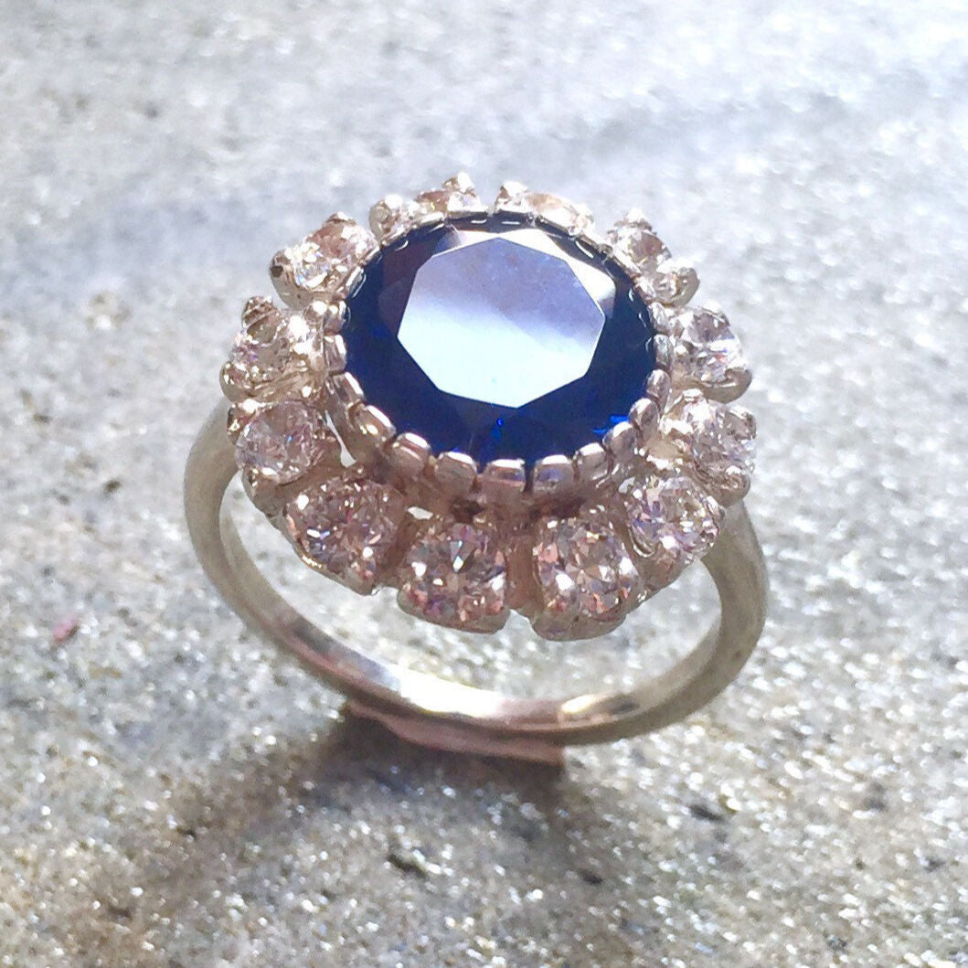 Created Sapphire Ring made in 925 Sterling Silver with Round Created Blue Sapphire in Halo setting, September Birthstone gift idea, symbolizes sincerity, truth, and faithfulness, ideal for everyday wear and perfect for birthday gifting and special occasions.