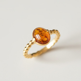 A stylish dining area with a trendy table, chic chairs, and elegant lighting, perfect for hosting dinner parties.