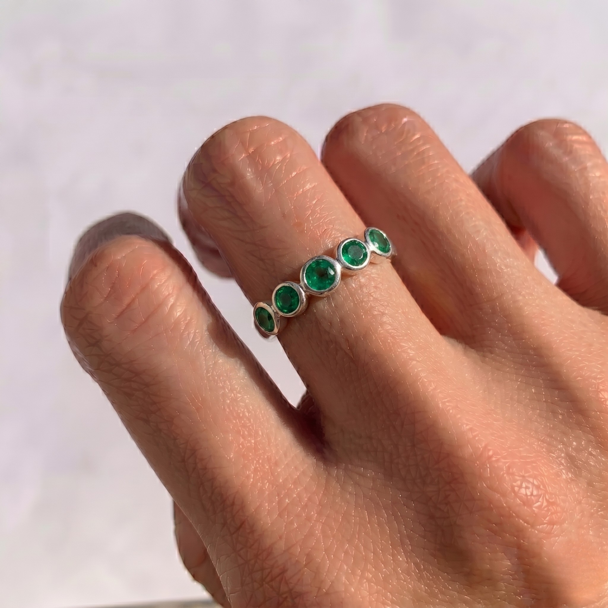 Elegant 925 Sterling Silver ring featuring a round Natural Emerald, symbolizing balance and emotional healing, perfect for daily wear.