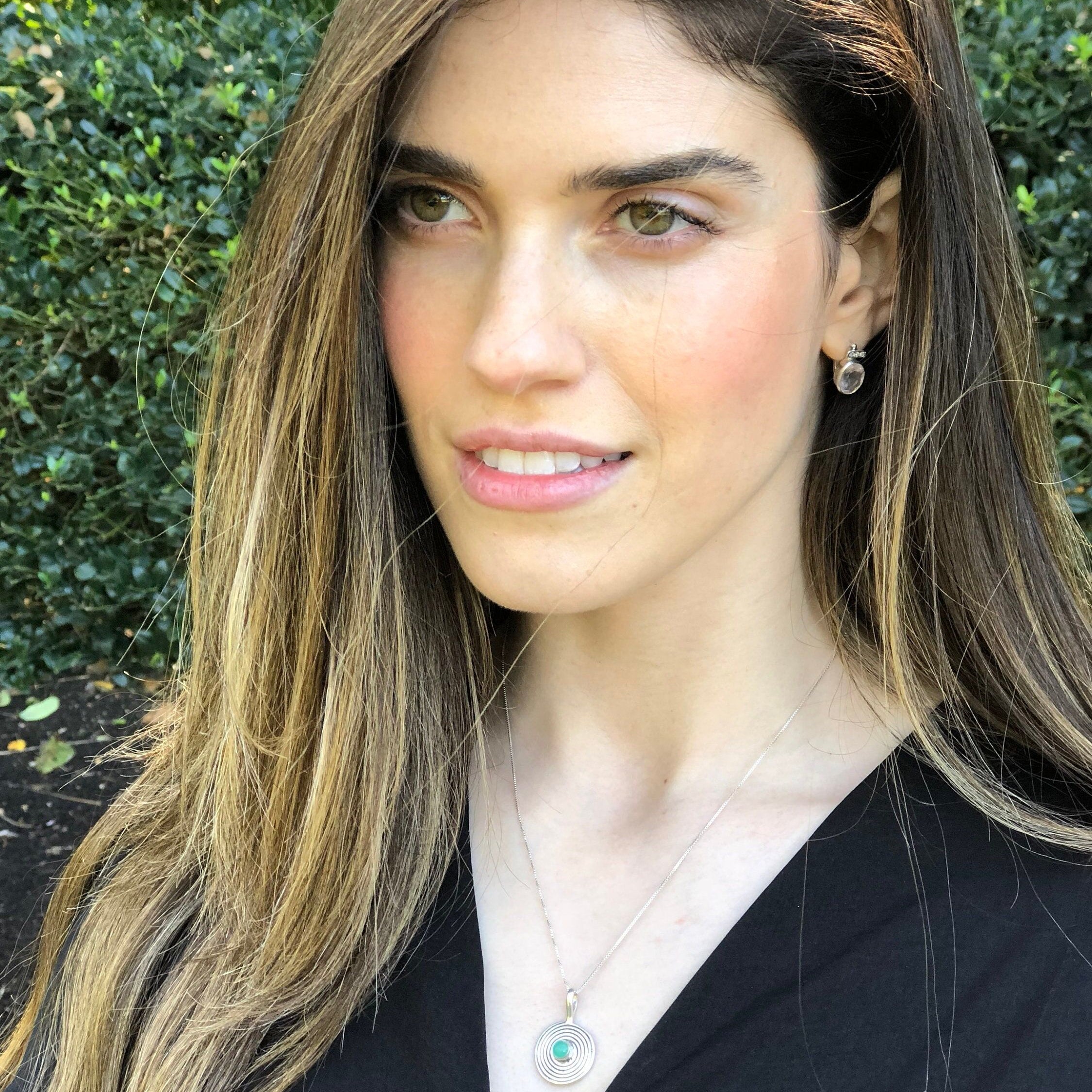 Elegant 925 Sterling Silver pendant featuring a round Created Green Emerald, perfect for birthdays and special occasions.