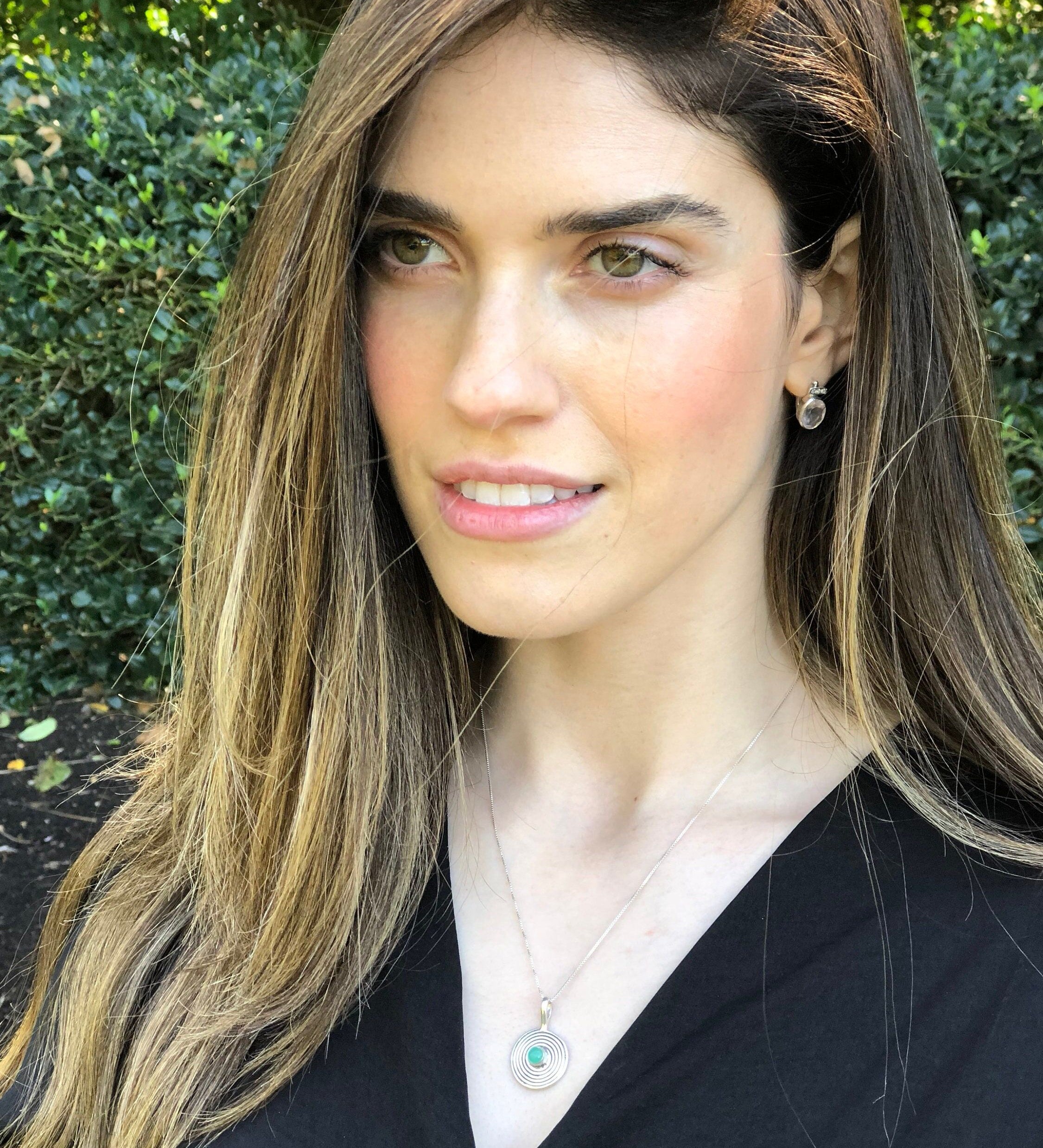 Elegant 925 Sterling Silver pendant featuring a round Created Green Emerald, perfect for birthdays and special occasions.