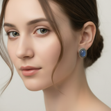 Beautiful handcrafted kyanite gemstone earrings in sterling silver bezel settings for women.