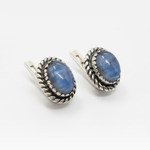 Stylish silver stud earrings witoval blue kyanite gemstones and intricate rope detailing.