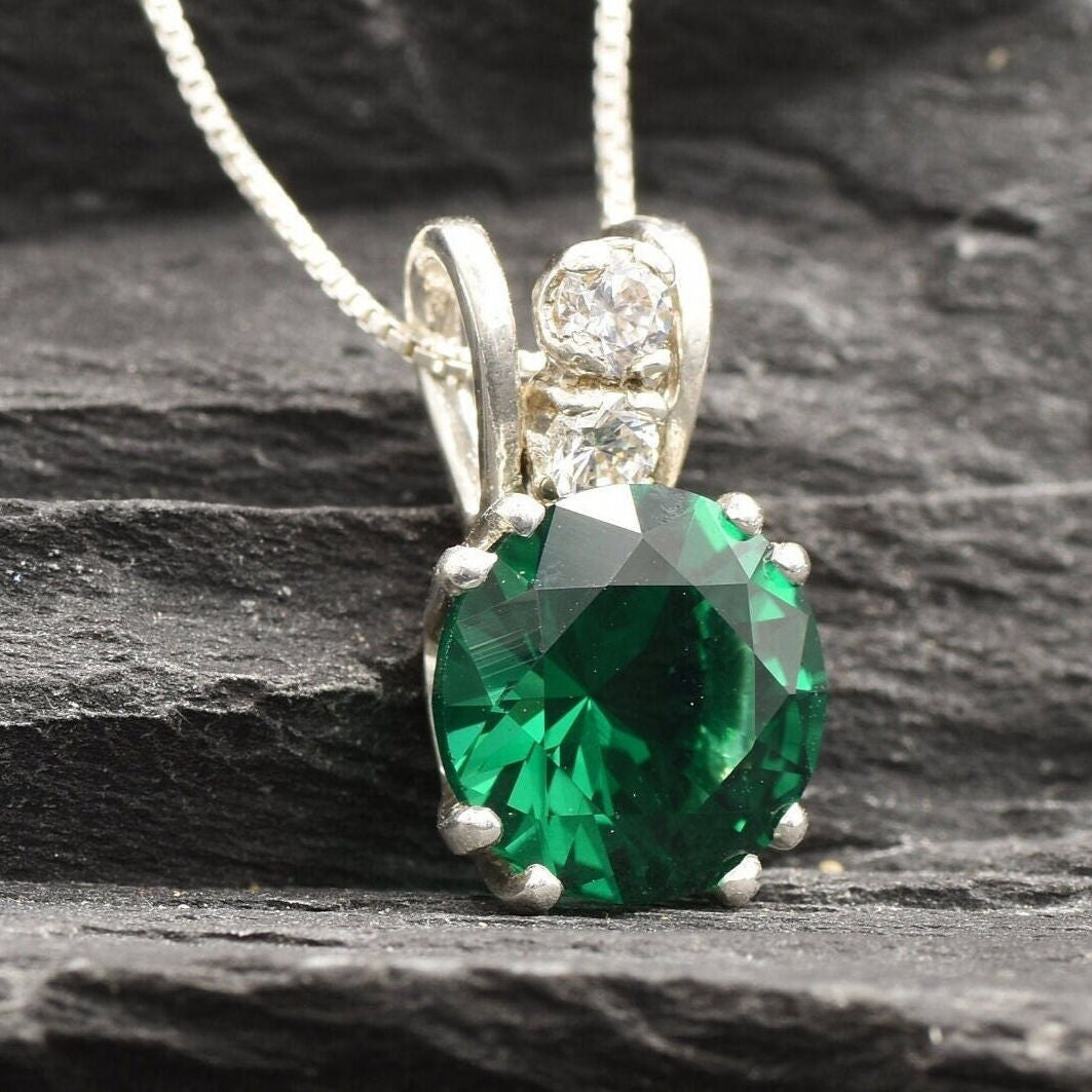 Stunning Created Emerald Pendant in 925 Sterling Silver, a May birthstone perfect for cherished moments and daily wear.