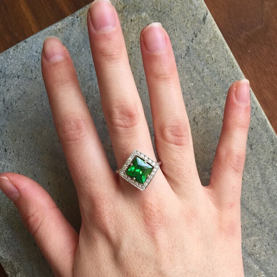 Beautifully crafted 925 Sterling Silver ring with a square Created Green Emerald, perfect for daily elegance and May celebrations.