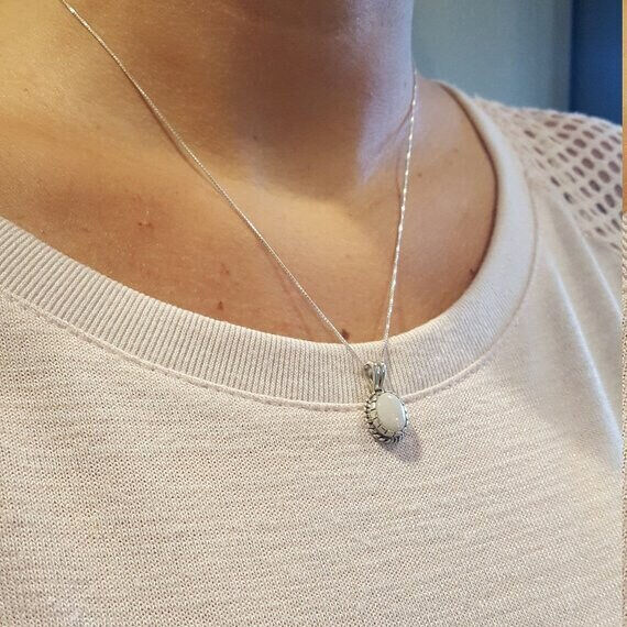 Natural Emerald Pendant in 925 Sterling Silver, perfect May birthday gift, symbolizes growth and emotional healing. Ideal for everyday wear.