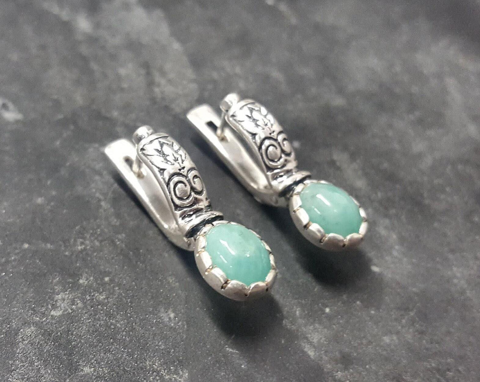 Natural Emerald Earrings made in 925 Sterling Silver with Oval Natural Green Emerald in Prong setting, May Birthstone gift idea, symbolizes growth, harmony, and deep emotional healing, ideal for everyday wear and perfect for birthday gifting and special occasions.