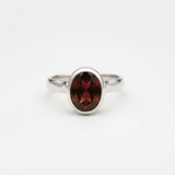 Elegant 925 Sterling Silver ring featuring a natural red garnet, ideal January birthday gift symbolizing love and commitment.
