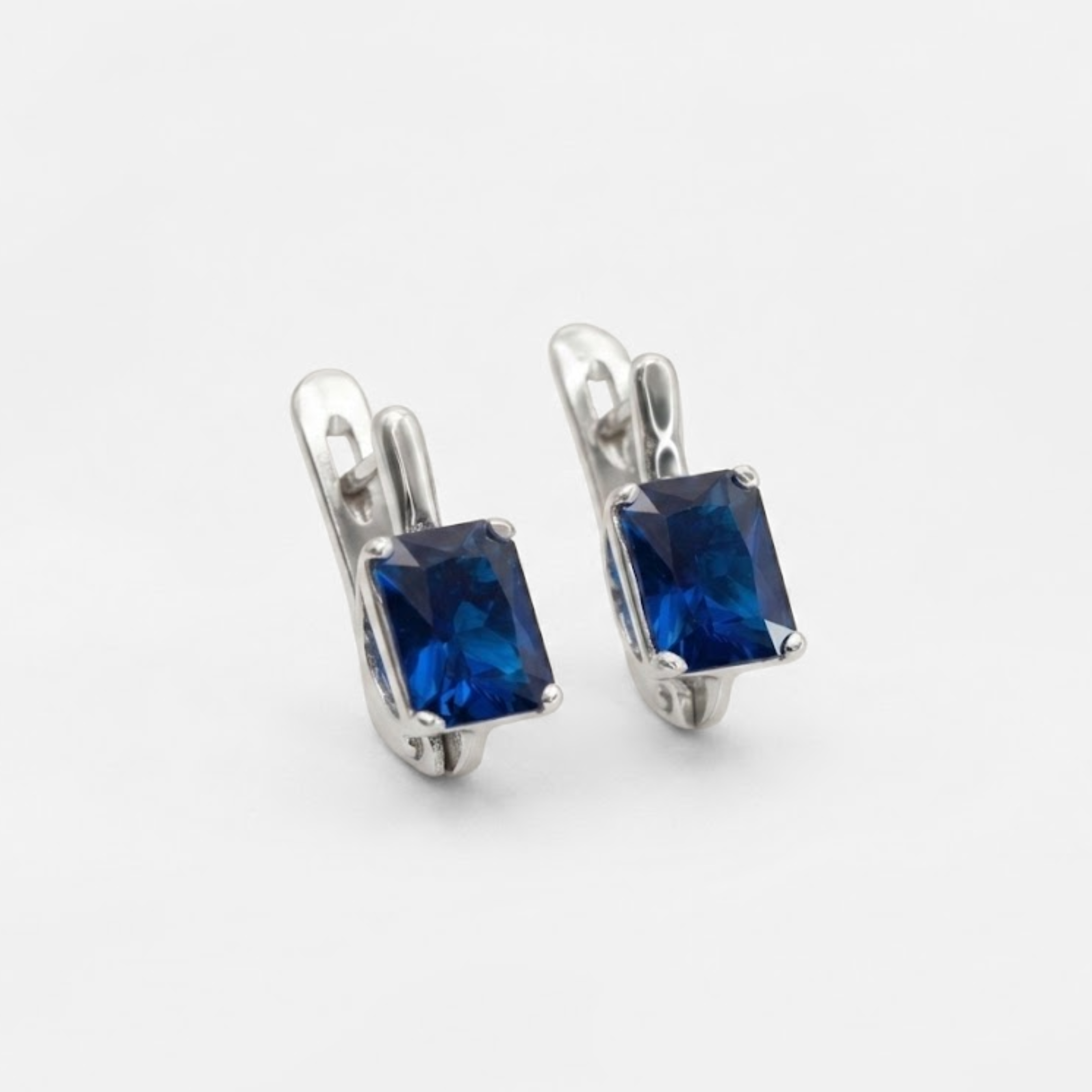 Created Sapphire Earrings made in 925 Sterling Silver with Baguette Created Blue Sapphire in Prong setting, September Birthstone gift idea, symbolizes sincerity, truth, and faithfulness, ideal for everyday wear and perfect for birthday gifting and special occasions.