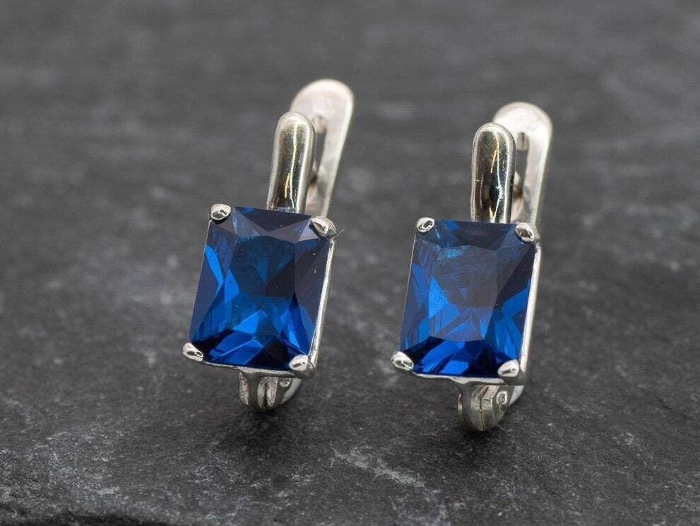 Created Sapphire Earrings made in 925 Sterling Silver with Baguette Created Blue Sapphire in Prong setting, September Birthstone gift idea, symbolizes sincerity, truth, and faithfulness, ideal for everyday wear and perfect for birthday gifting and special occasions.