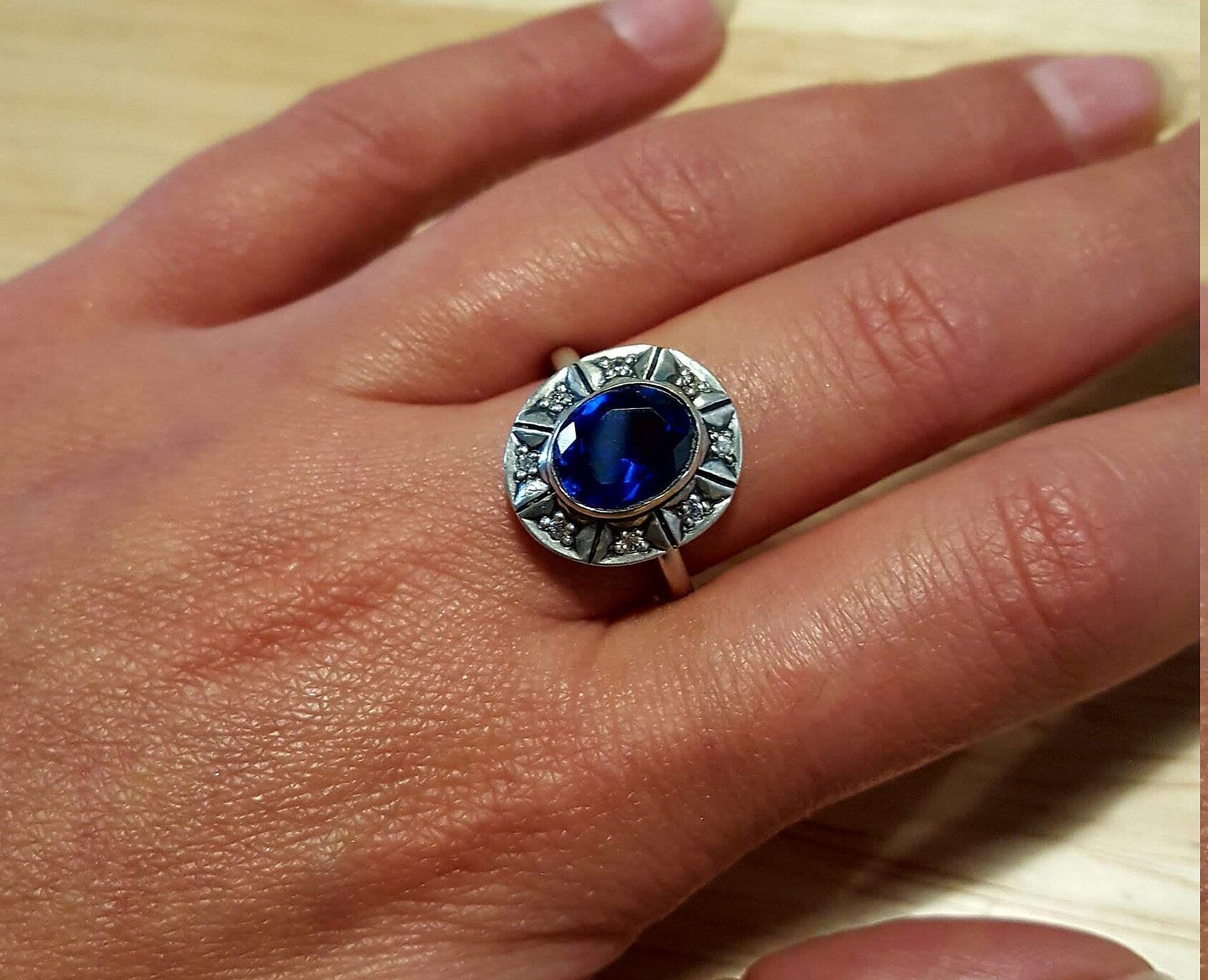Elegant 925 Sterling Silver ring featuring a Baguette Created Blue Sapphire, ideal for September birthdays and special occasions.