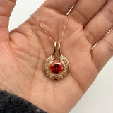 Stunning Rose Gold Vermeil Ruby Pendant with a vibrant Round Created Ruby, making it a thoughtful gift for July celebrations.