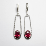 Created Ruby Earrings made in 925 Sterling Silver with Oval Created Red Ruby in Bezel setting, July Birthstone gift idea, symbolizes nobility, purity, and passion, ideal for everyday wear and perfect for birthday gifting and special occasions.