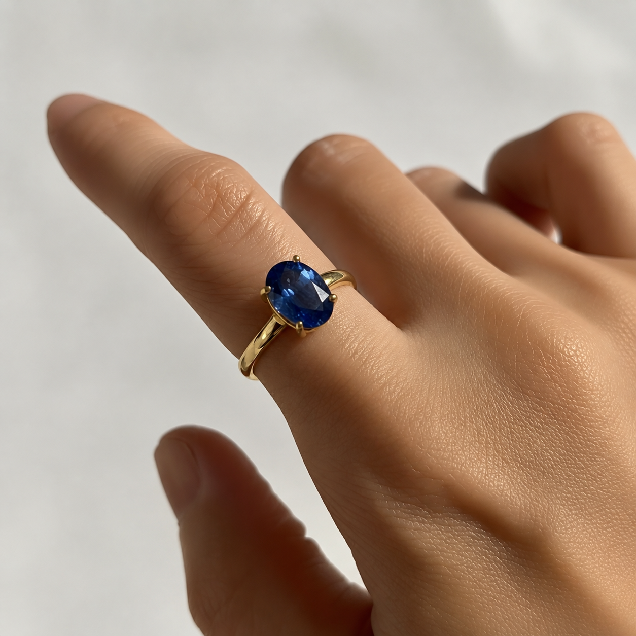 Elegant 18k Gold Vermeil ring with Baguette Created Blue Sapphire, perfect September birthday gift symbolizing sincerity and faithfulness.