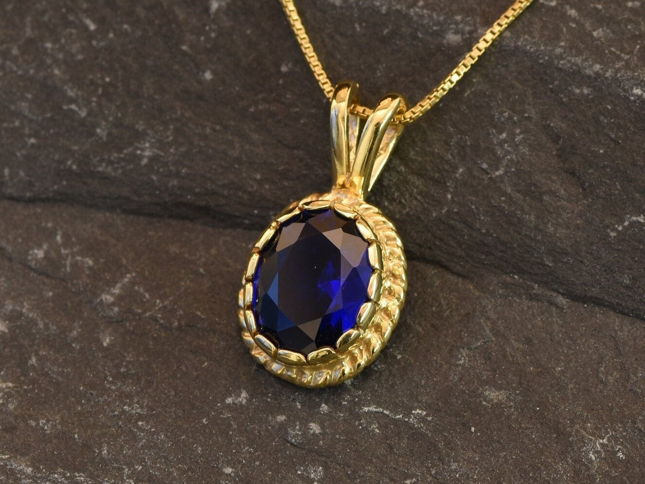 Created Sapphire Pendant made in 18k Gold Vermeil with Oval Created Blue Sapphire in Solitaire setting, September Birthstone gift idea, symbolizes sincerity, truth, and faithfulness, ideal for everyday wear and perfect for birthday gifting and special occasions.