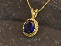 Created Sapphire Pendant made in 18k Gold Vermeil with Oval Created Blue Sapphire in Solitaire setting, September Birthstone gift idea, symbolizes sincerity, truth, and faithfulness, ideal for everyday wear and perfect for birthday gifting and special occasions.