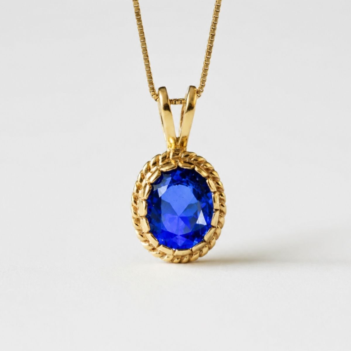 Created Sapphire Pendant made in 18k Gold Vermeil with Oval Created Blue Sapphire in Solitaire setting, September Birthstone gift idea, symbolizes sincerity, truth, and faithfulness, ideal for everyday wear and perfect for birthday gifting and special occasions.